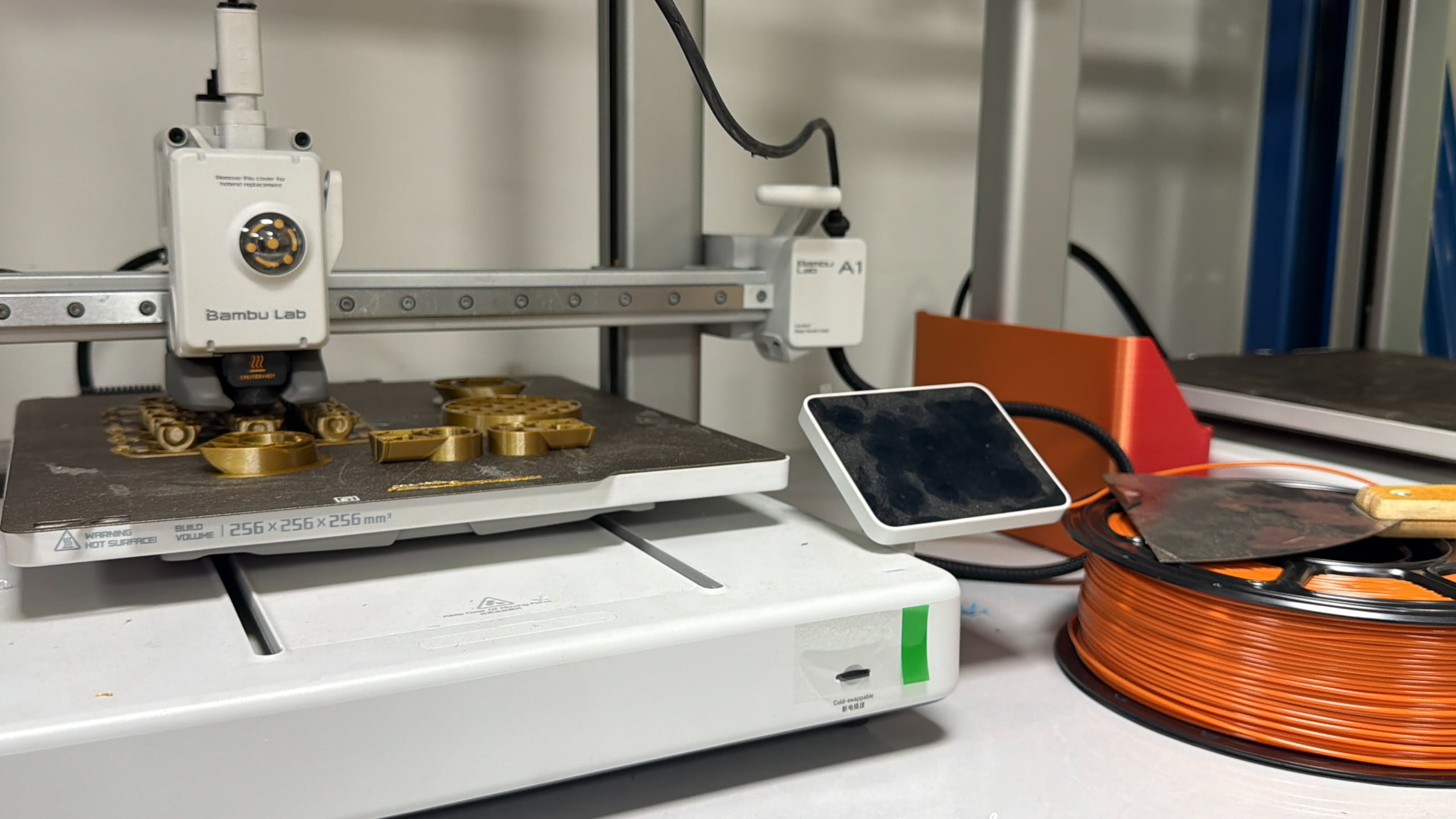 PLA+ filament samples and printed parts prepared for comparison